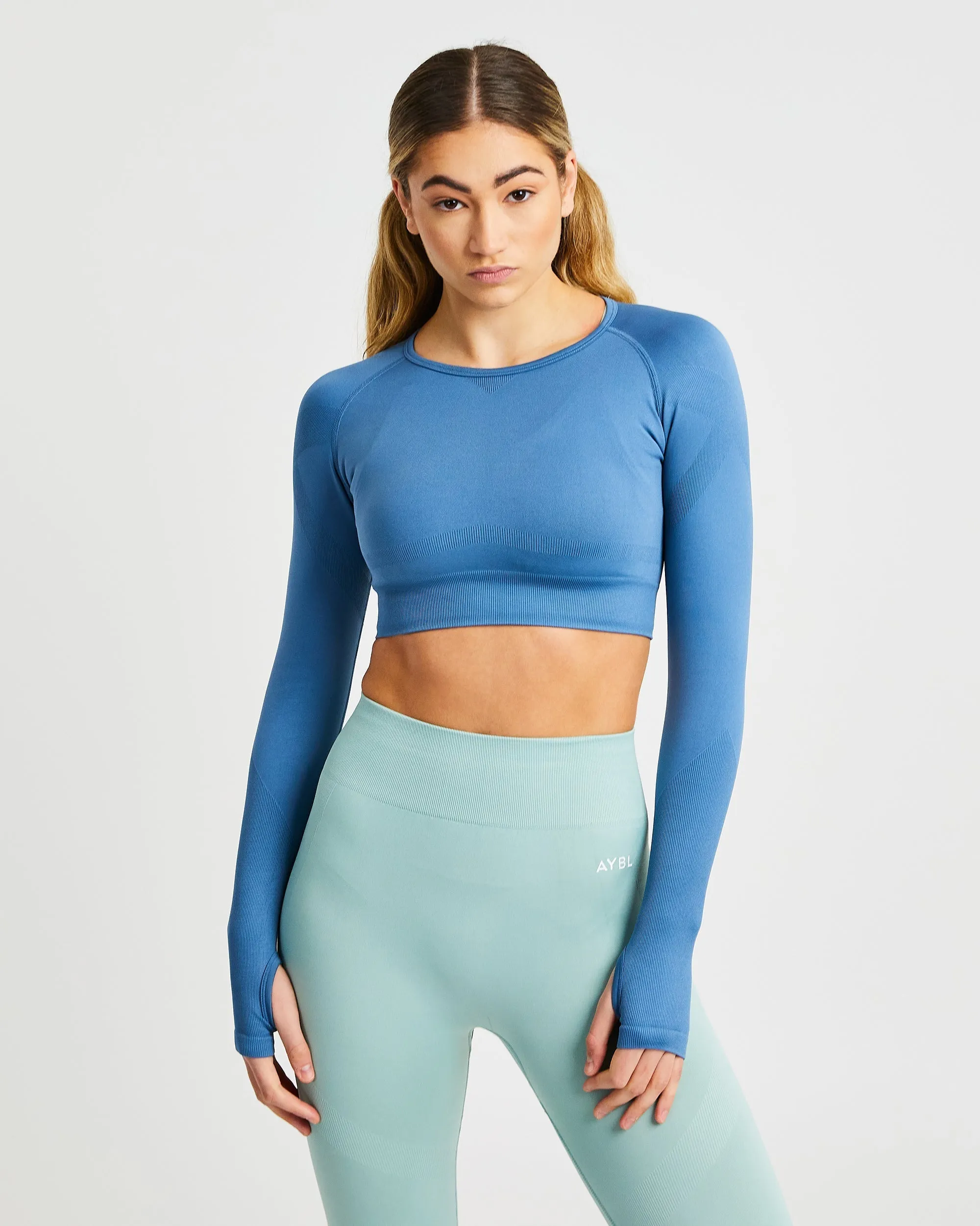 Reform Seamless Long Sleeve Crop Top - Petrol Blue sold by AYBL