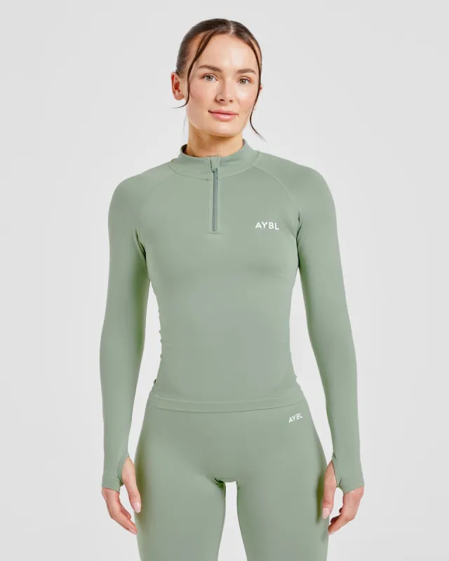 Empower Seamless 1/2 Zip Jacket - Grove Green sold by AYBL
