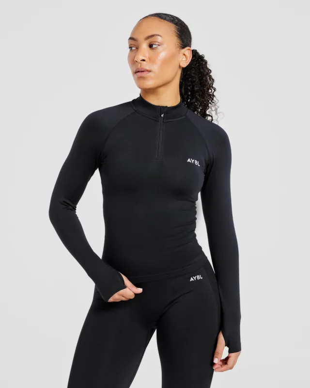 Empower Seamless 1/2 Zip Jacket - Black sold by AYBL