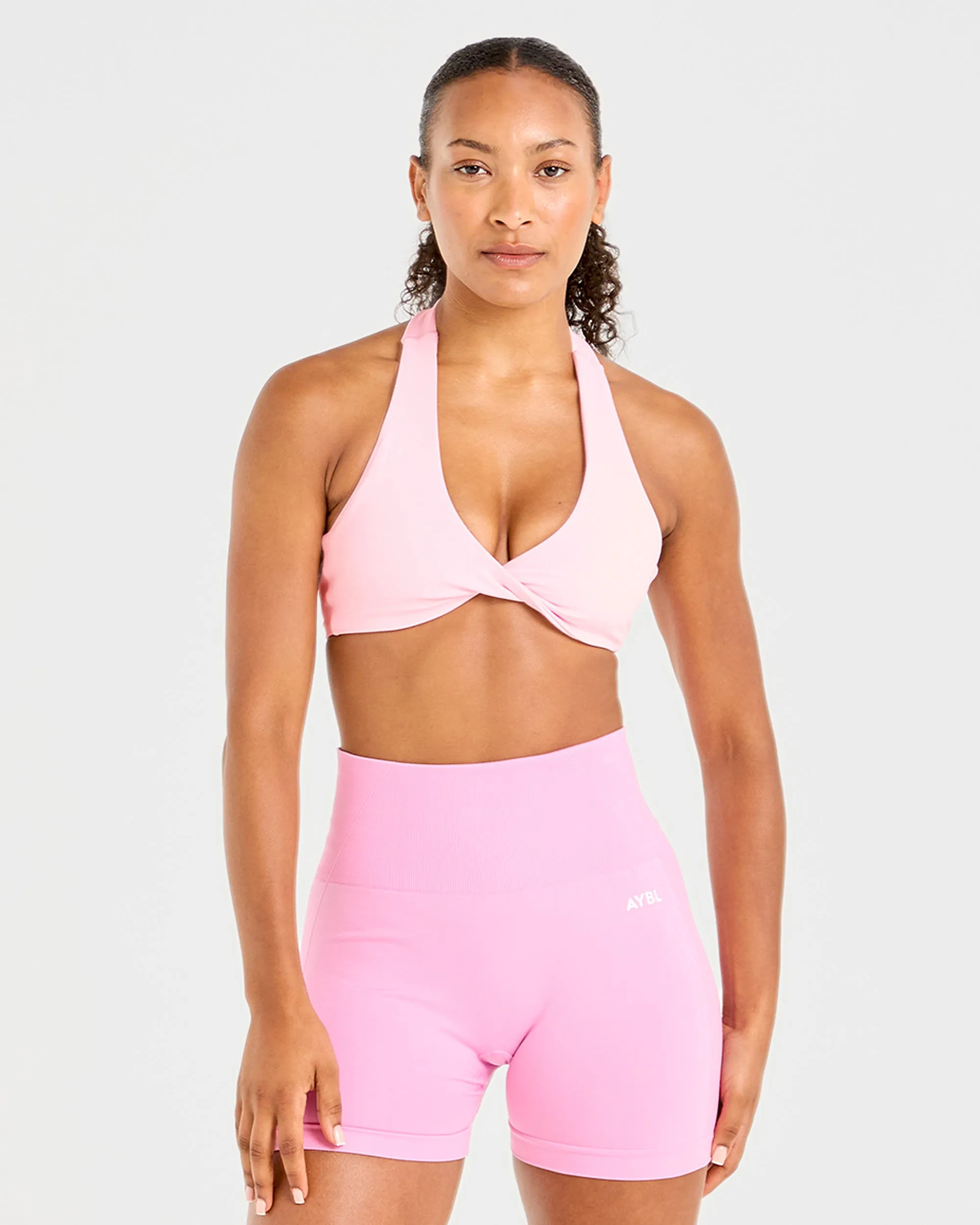 Essential Halterneck Sports Bra - Baby Pink sold by AYBL