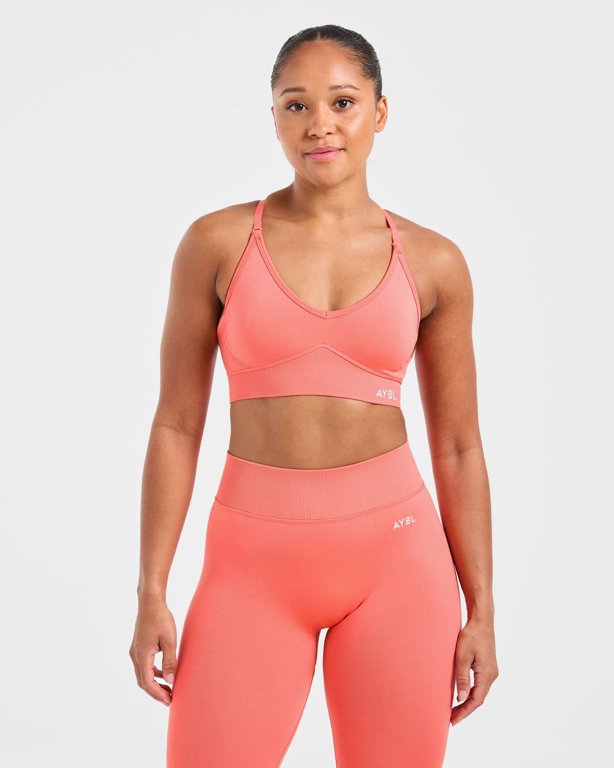 Adapt Seamless Sports Bra - Summer Peach sold by AYBL