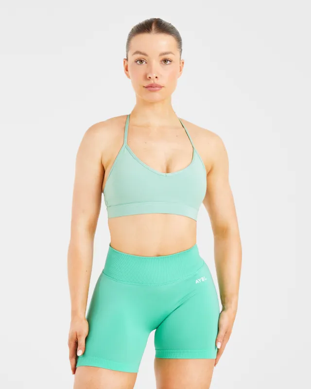 Essential V Neck Strappy Sports Bra - Light Sage sold by AYBL