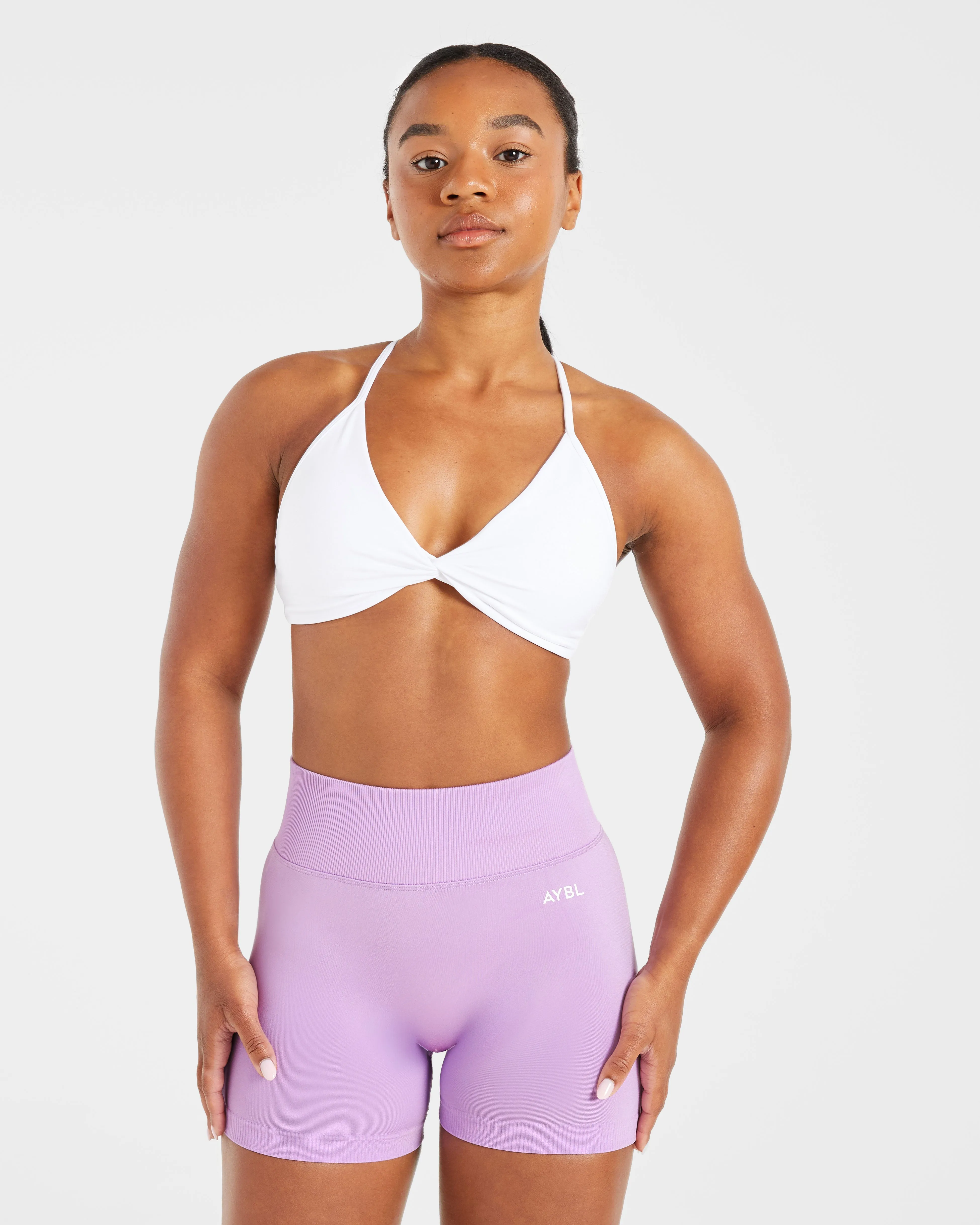 Essential Twist Crossback Sports Bra - White sold by AYBL