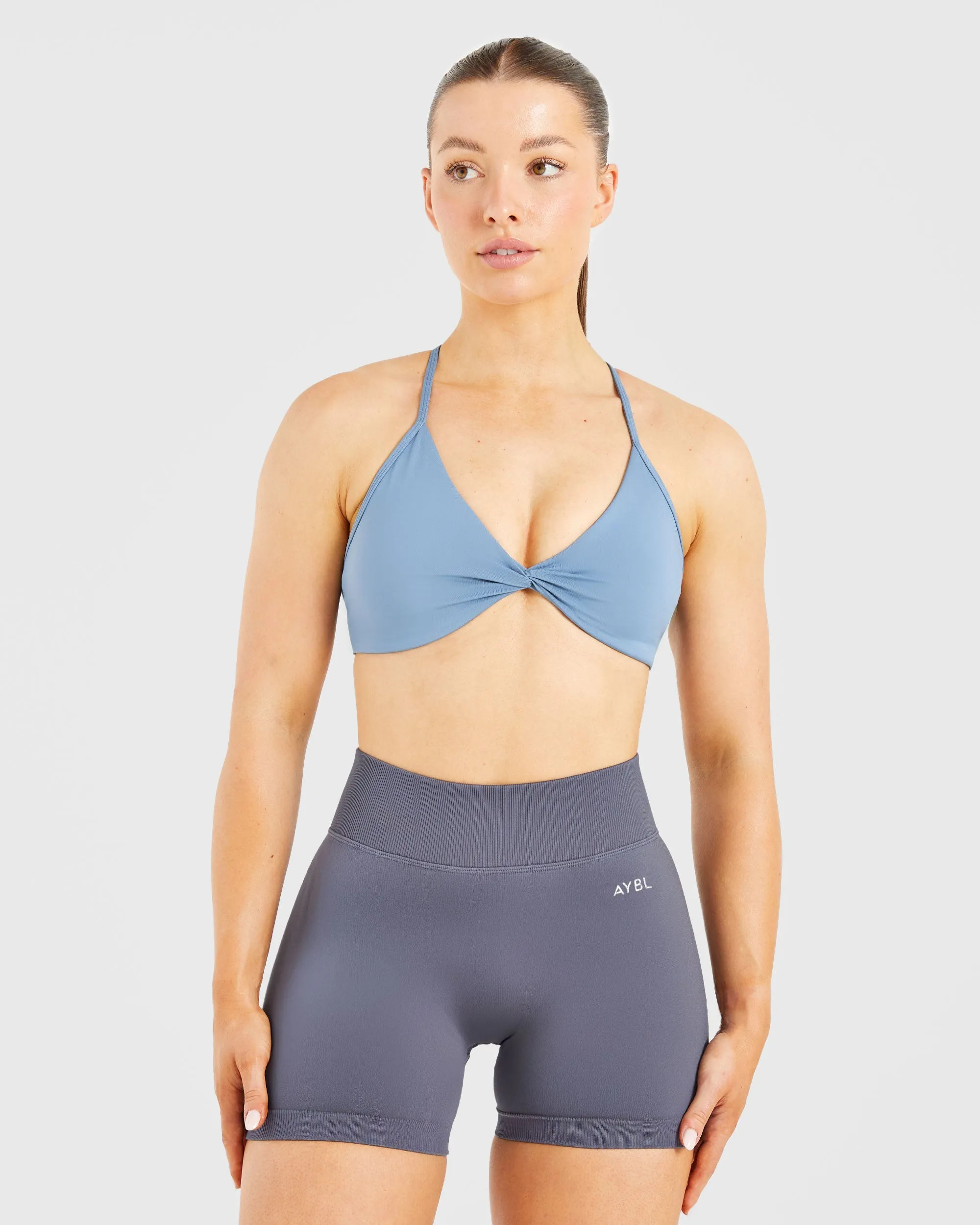 Essential Twist Crossback Sports Bra - Slate Blue sold by AYBL