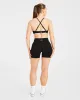 Essential Twist Crossback Sports Bra - Black sold by AYBL