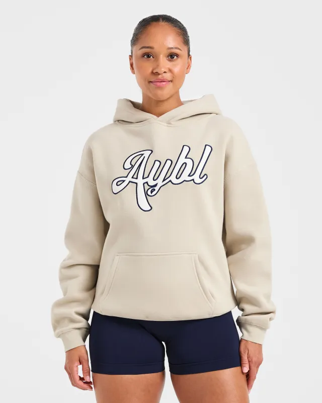 Script Embroidered Oversized Hoodie - Sand/Navy sold by AYBL
