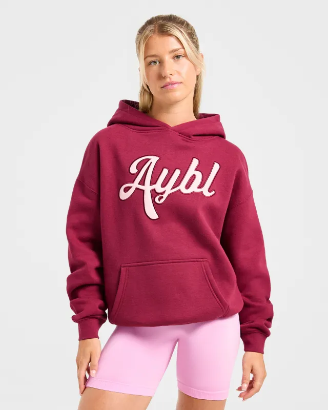 Script Embroidered Oversized Hoodie - Burgundy/Pink sold by AYBL