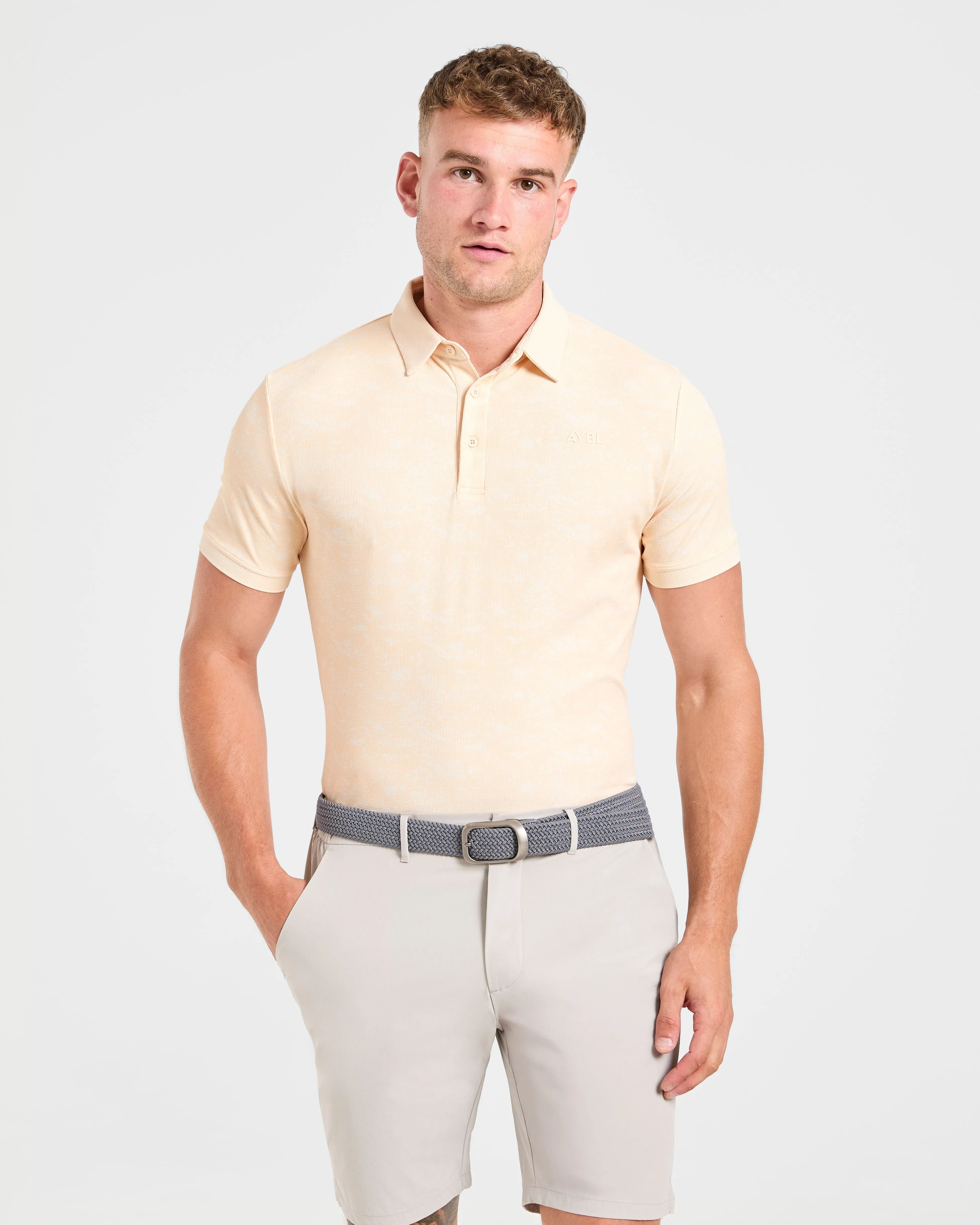 Precision Texture Polo - Peach sold by AYBL