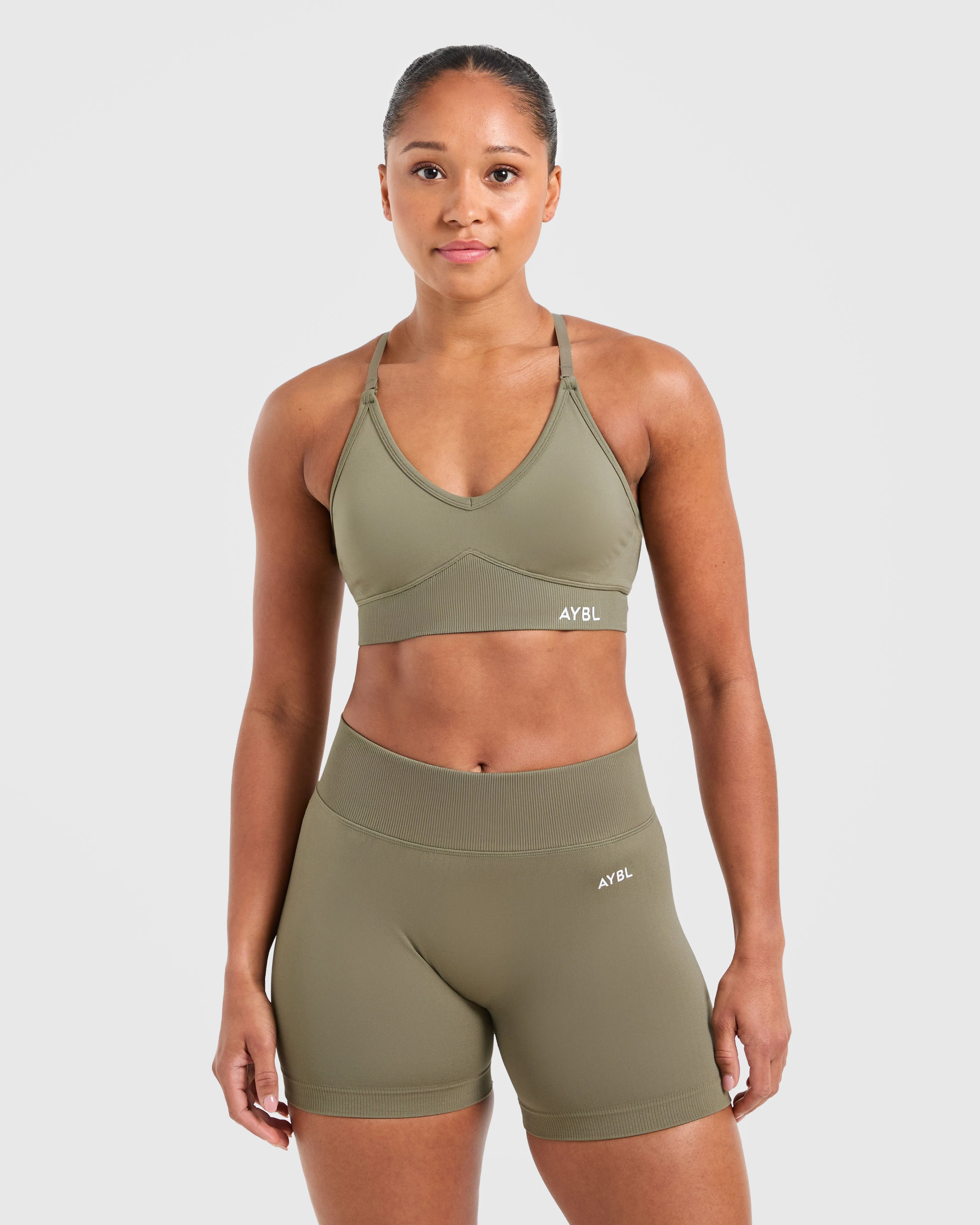 Adapt Seamless Sports Bra - Muted Olive sold by AYBL