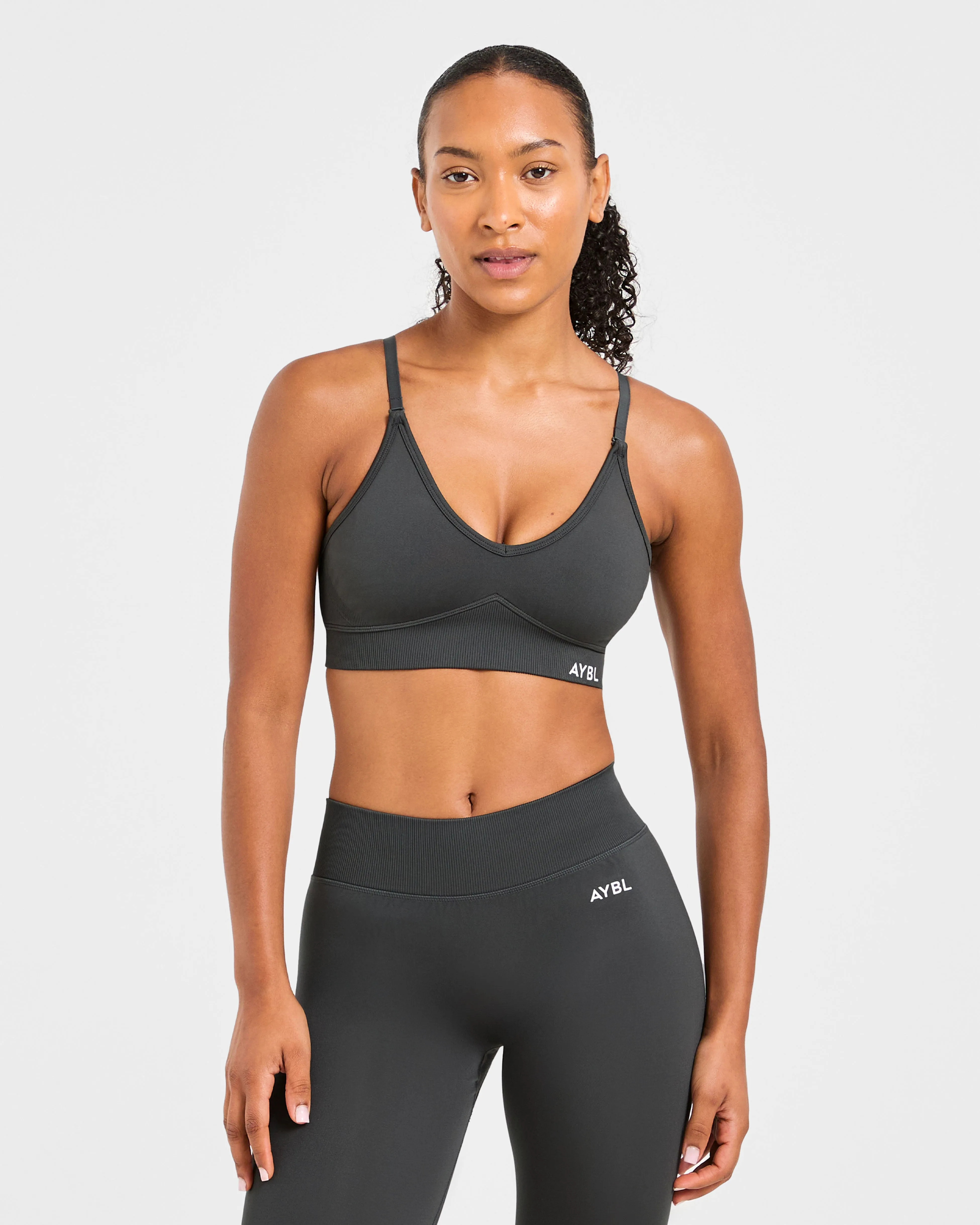 Adapt Seamless Sports Bra - Dark Charcoal sold by AYBL