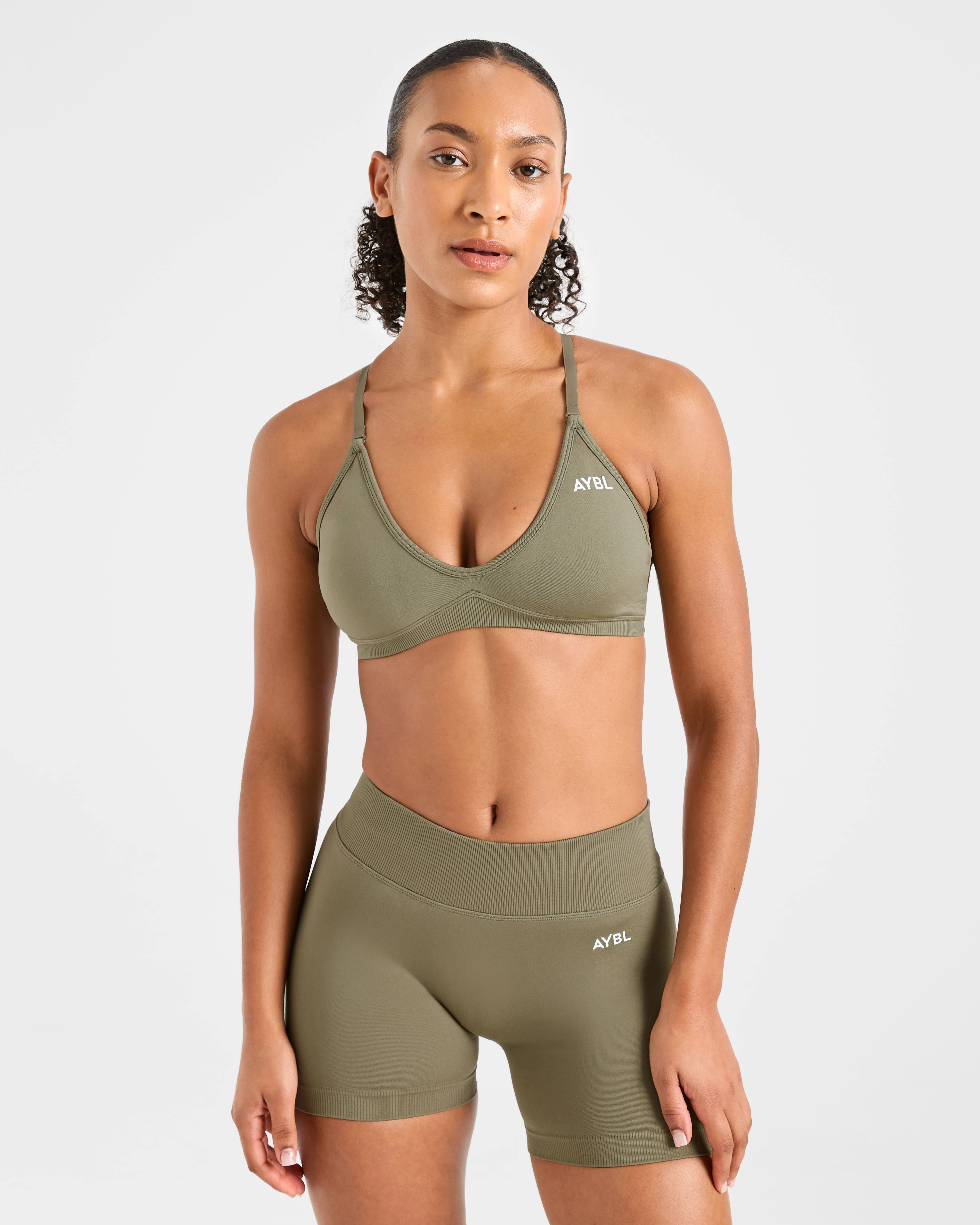 Adapt Seamless Strappy Sports Bra - Muted Olive sold by AYBL