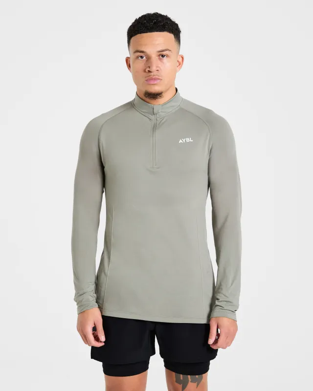 Essential Seamless 1/4 Zip Pullover  - Olive sold by AYBL