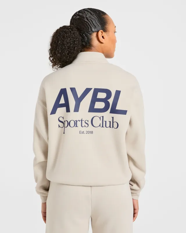 Sports Club Oversized 1/4 Zip Pullover - Sand/Navy made by AYBL
