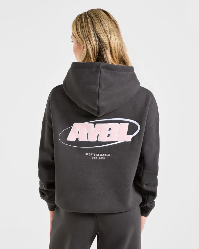 Sports Essentials Oversized Hoodie - Charcoal/Pink made by AYBL