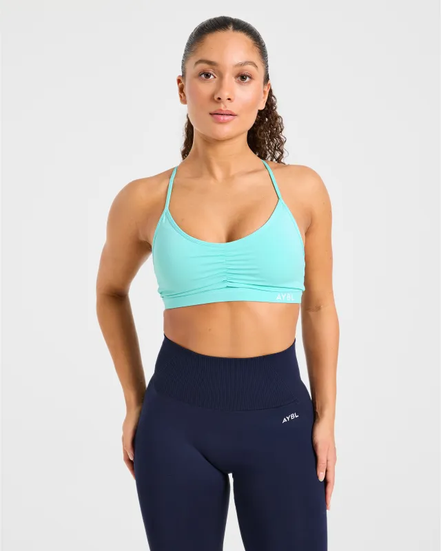 Essential Ruched Sports Bra - Soft Aqua made by AYBL