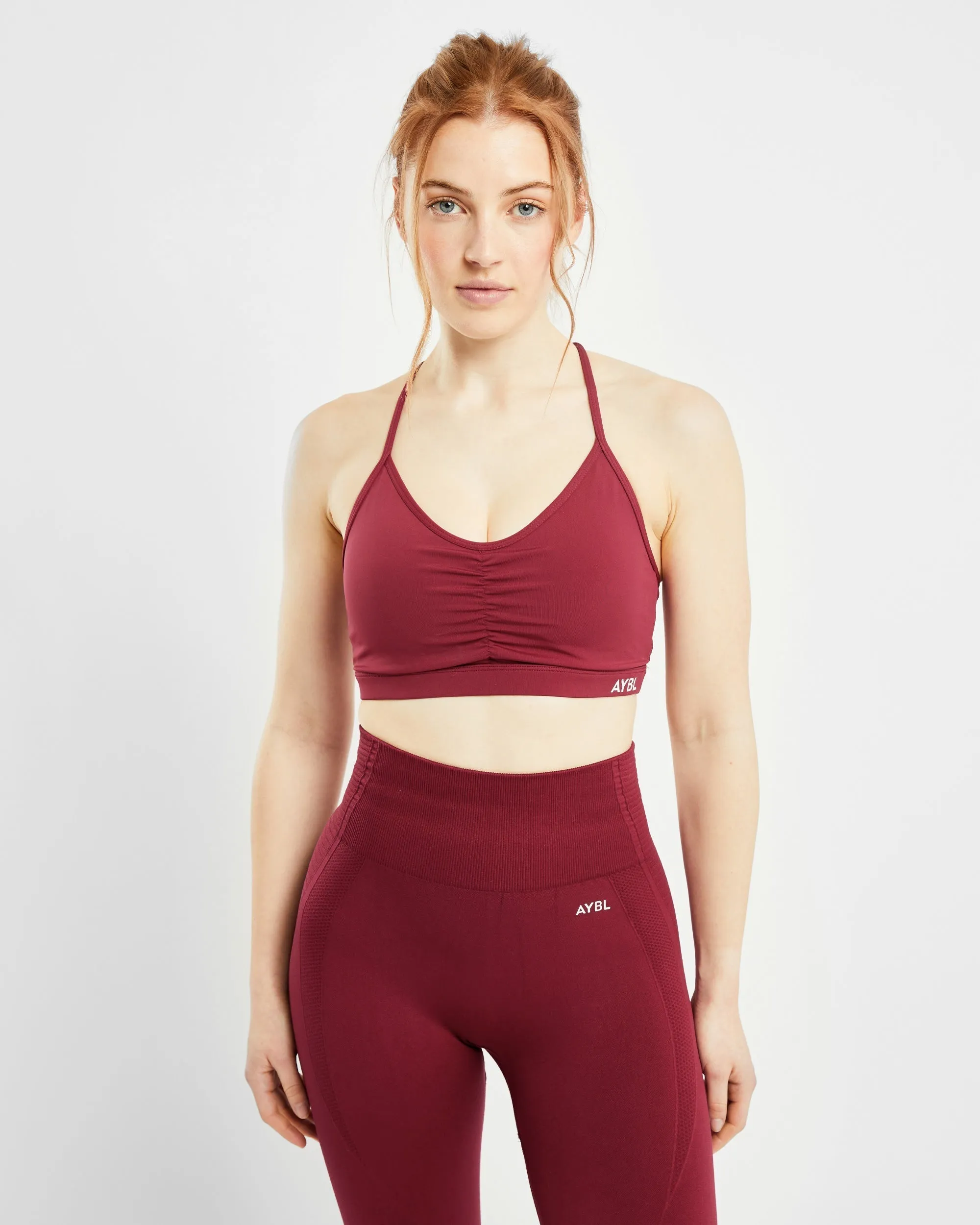 Essential Ruched Sports Bra - Rumba Red sold by AYBL