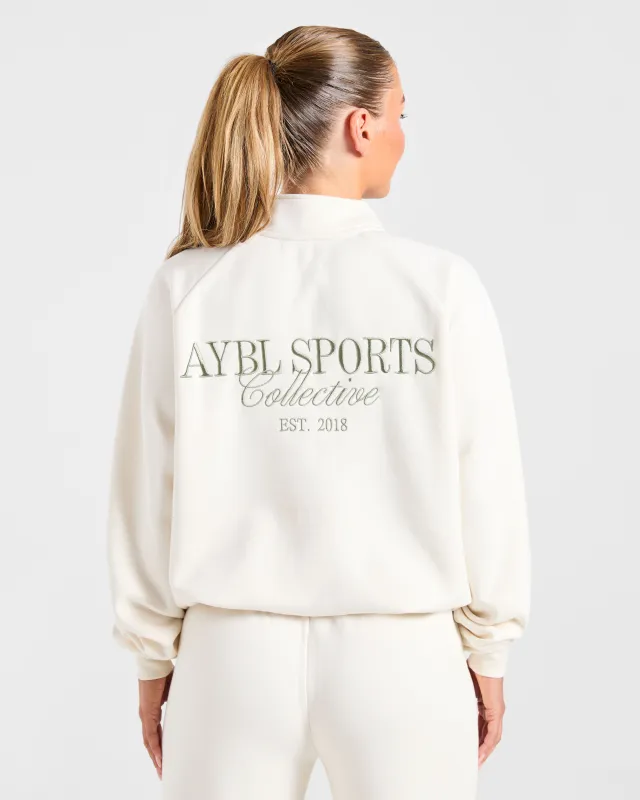 Sports Collective Oversized 1/4 Zip Pullover - Off White/Green made by AYBL