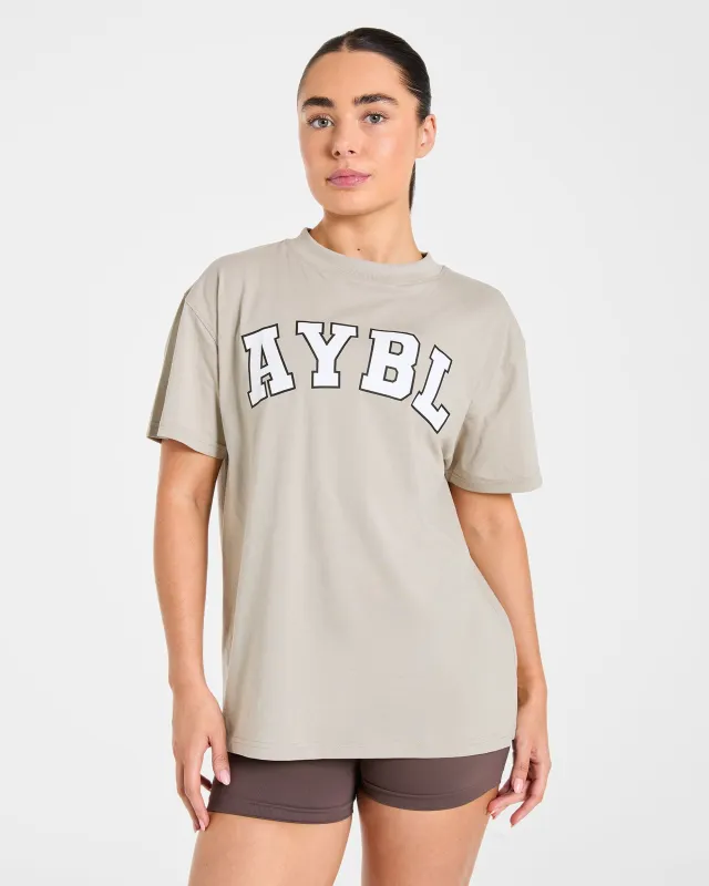 Varsity 2.0 Oversized T Shirt - Taupe made by AYBL