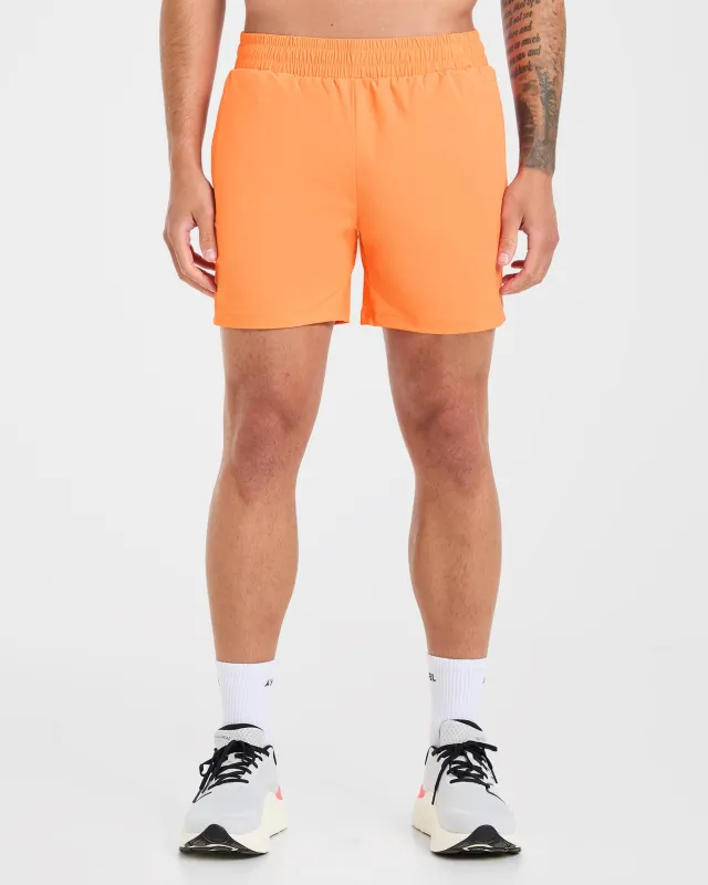 Run 5" Shorts - Bright Orange made by AYBL