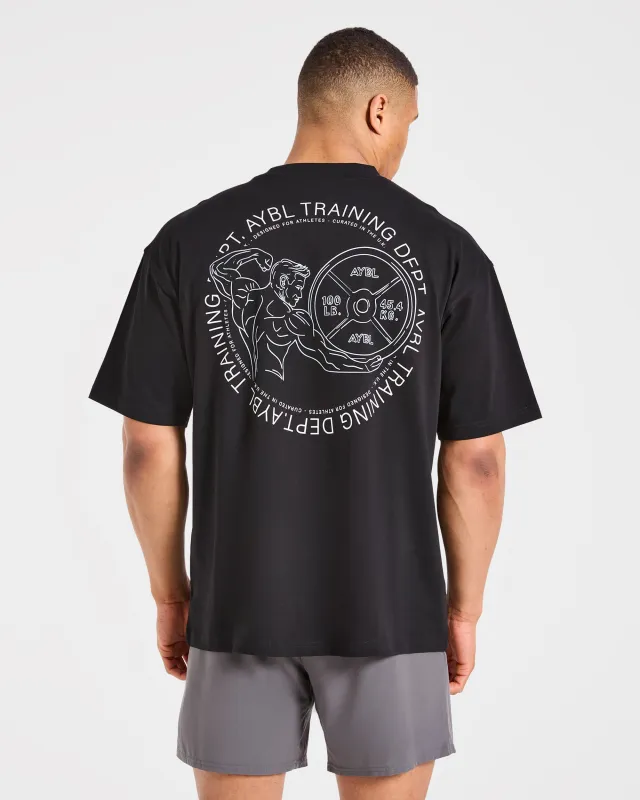Training Dept. Illustration Oversized T Shirt - Black made by AYBL