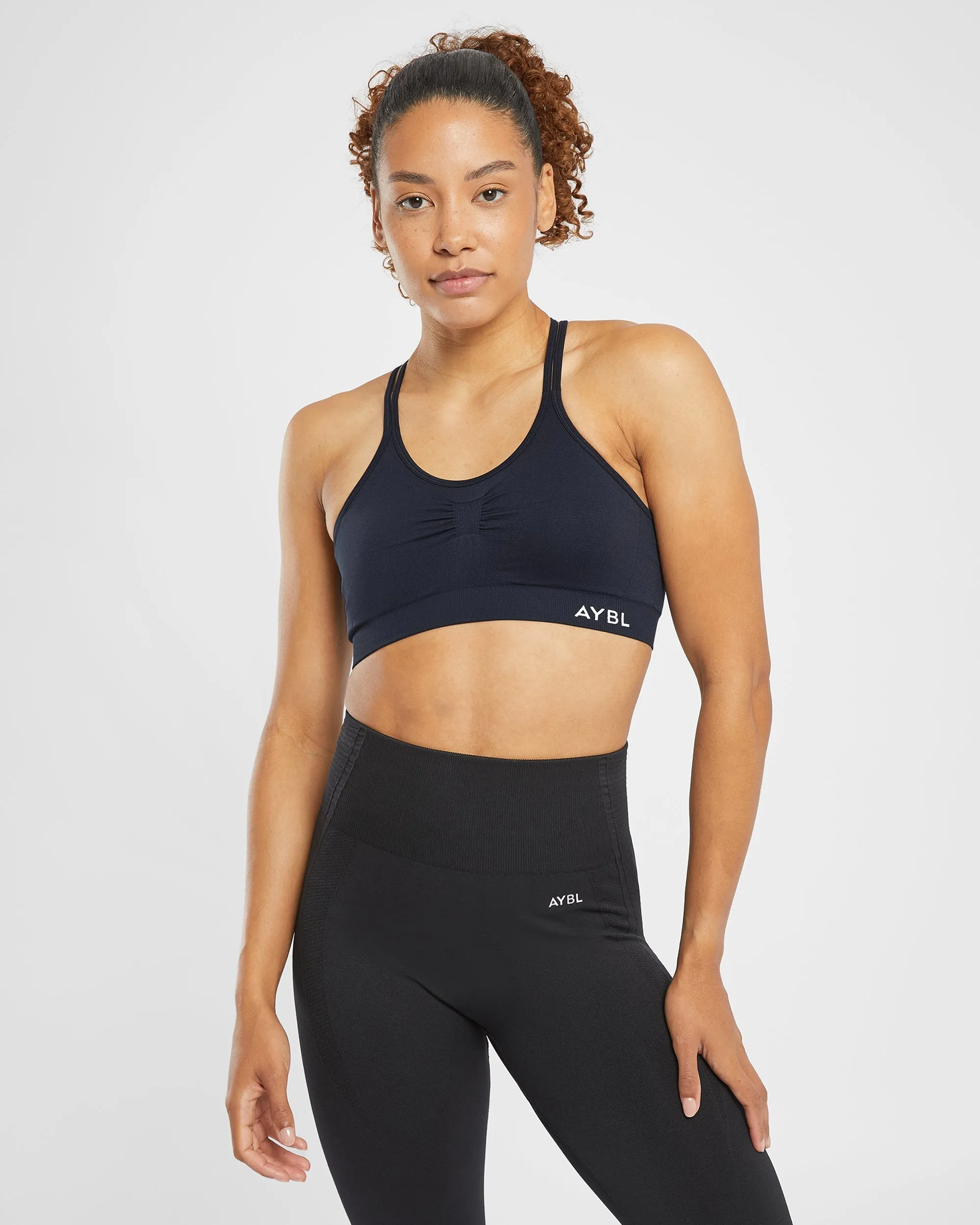 Essential Seamless Ruched Sports Bra - Navy sold by AYBL