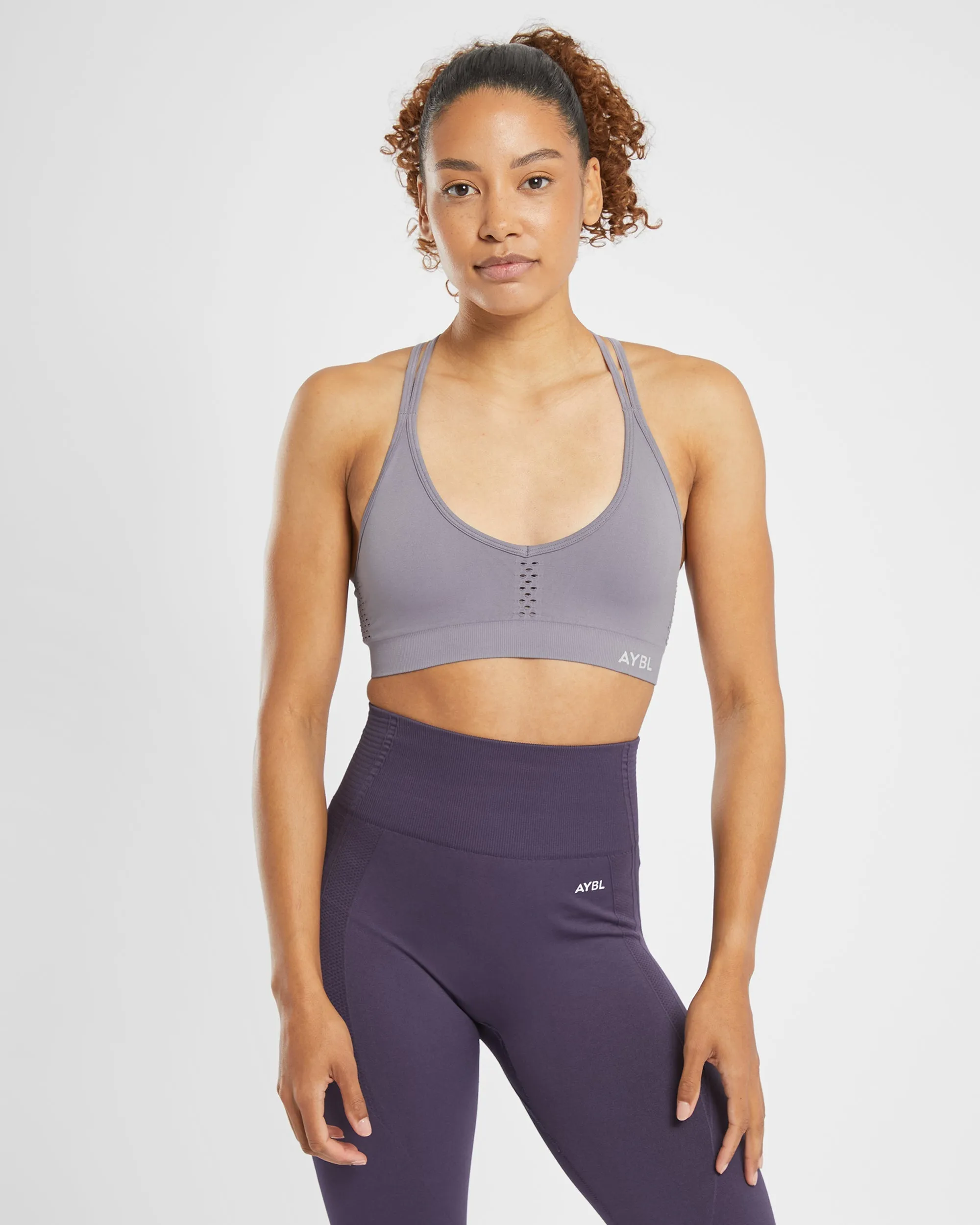 Essential Seamless Strappy Sports Bra - Muted Lavender sold by AYBL