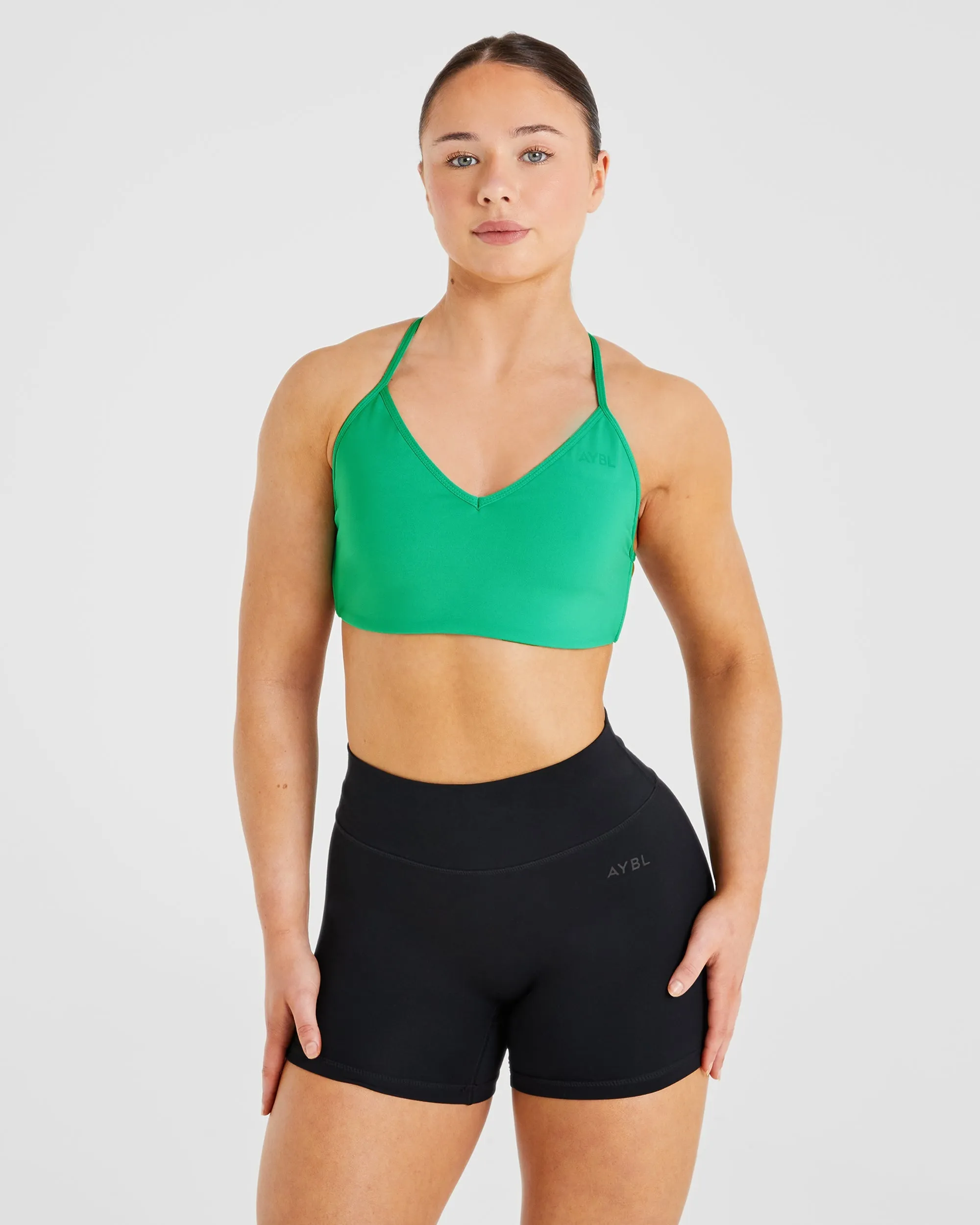 Essential Crossback Sports Bra - Emerald Green sold by AYBL