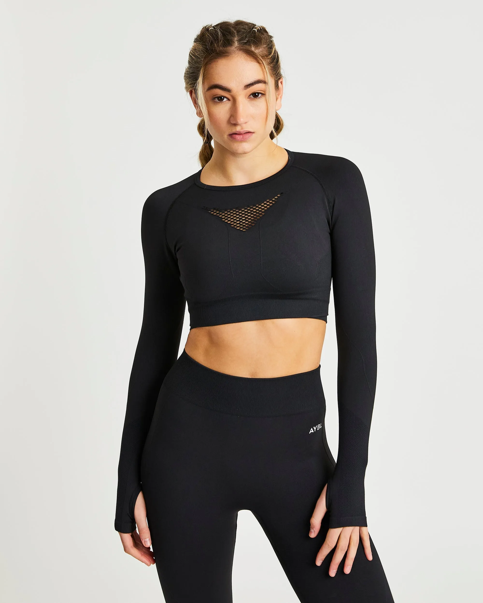 Motion Seamless Long Sleeve Crop Top - Black sold by AYBL