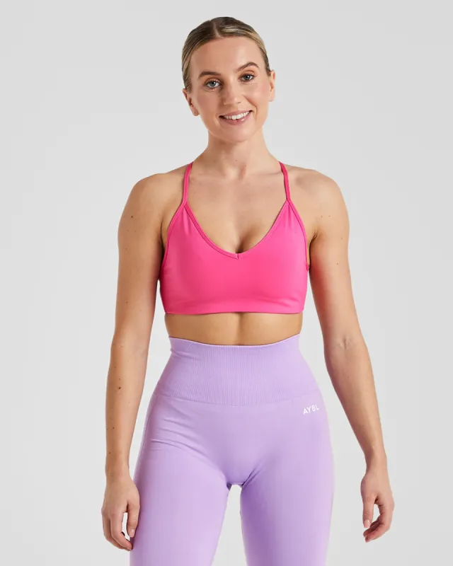 Essential Crossback Sports Bra - Hot Pink sold by AYBL