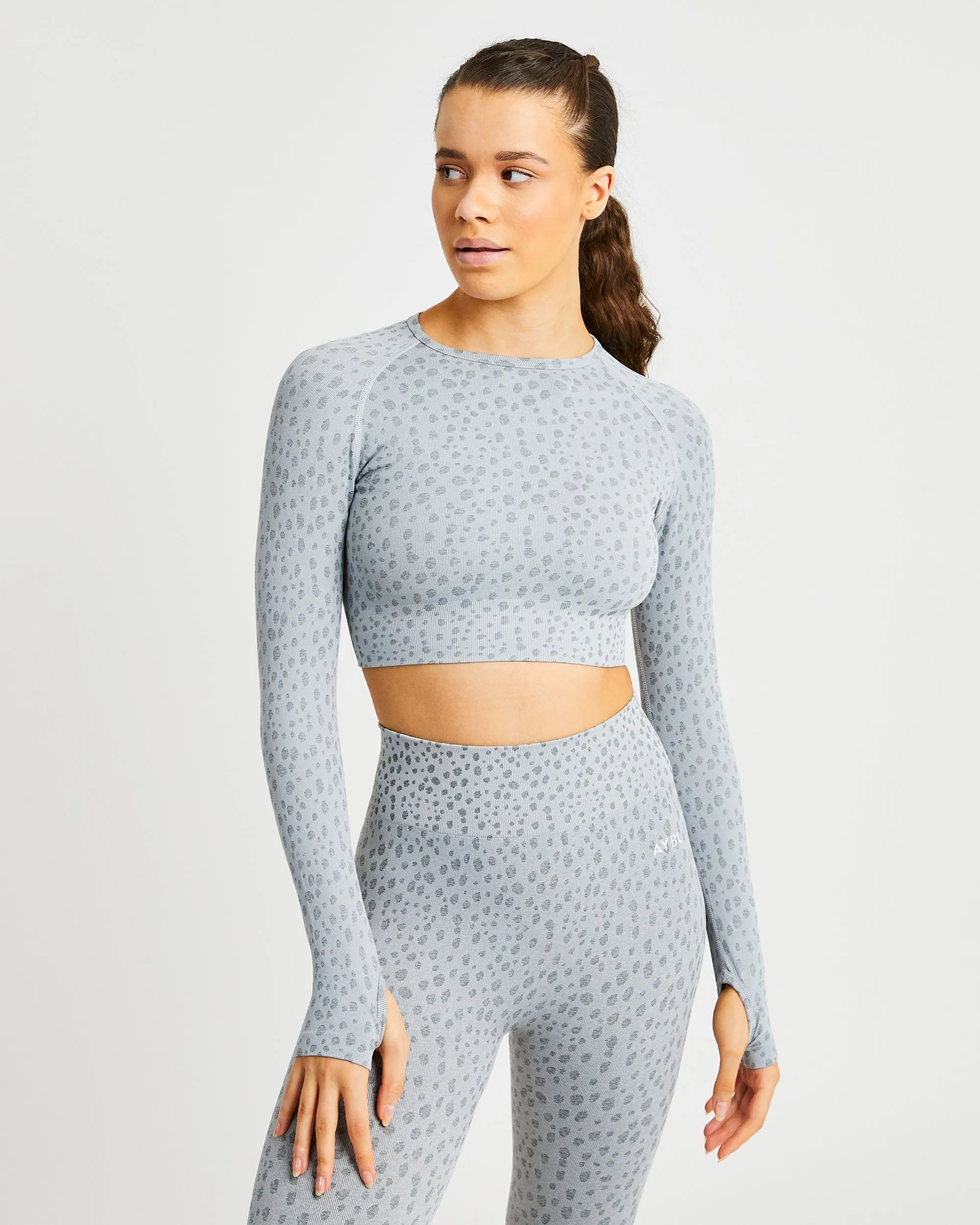 Evolve Speckle Seamless Long Sleeve Crop Top - Light Grey sold by AYBL