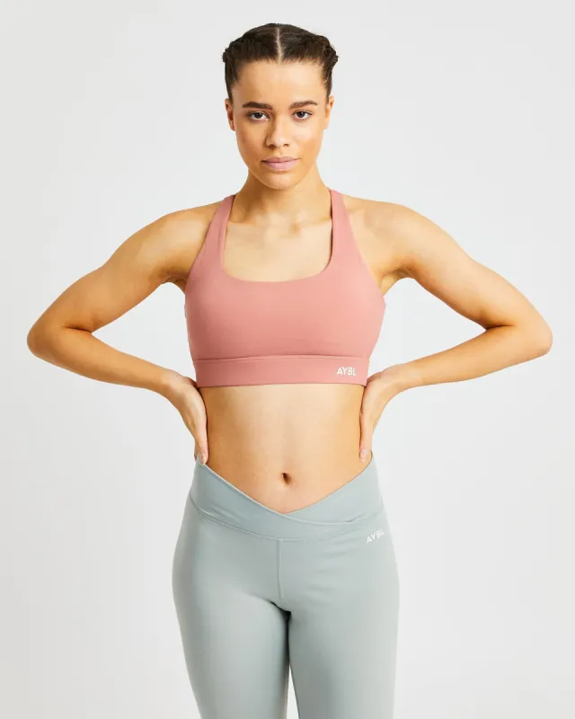 Flow Sports Bra - Terracotta Pink sold by AYBL