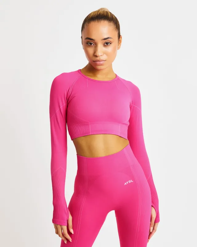 Reflex Seamless Long Sleeve Crop Top - Fuchsia Pink sold by AYBL