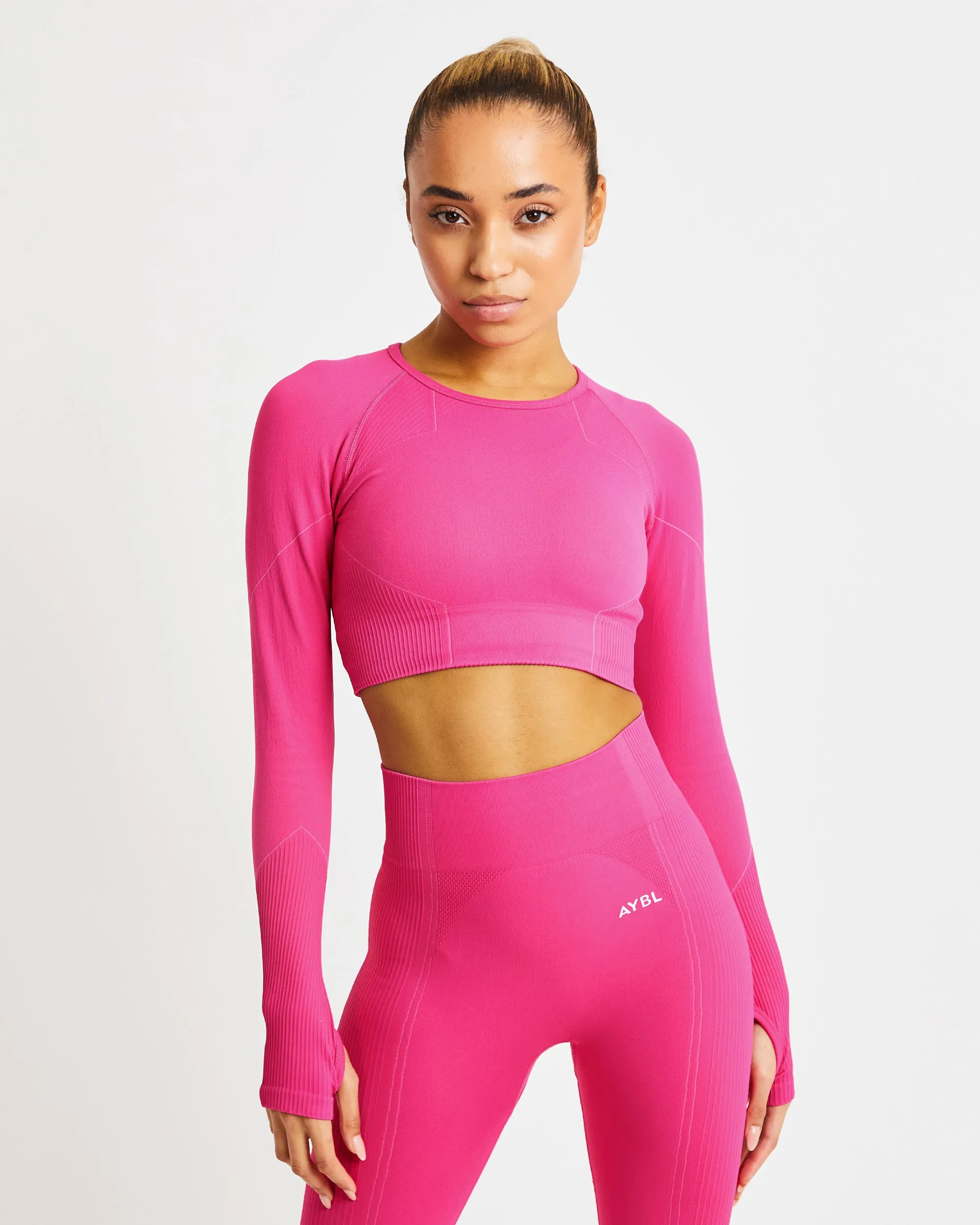 Reflex Seamless Long Sleeve Crop Top - Fuchsia Pink sold by AYBL