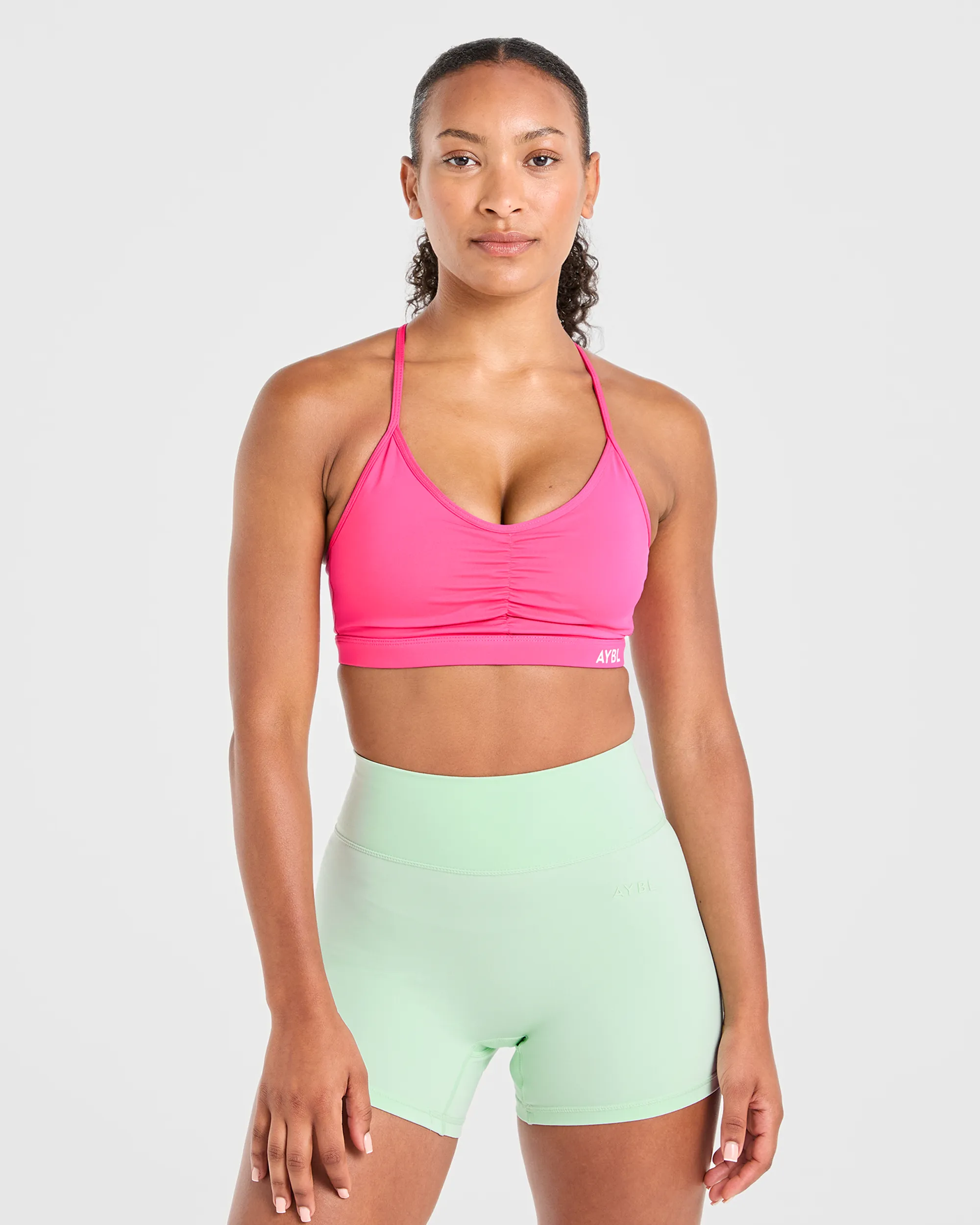 Essential Ruched Sports Bra - Hot Pink sold by AYBL