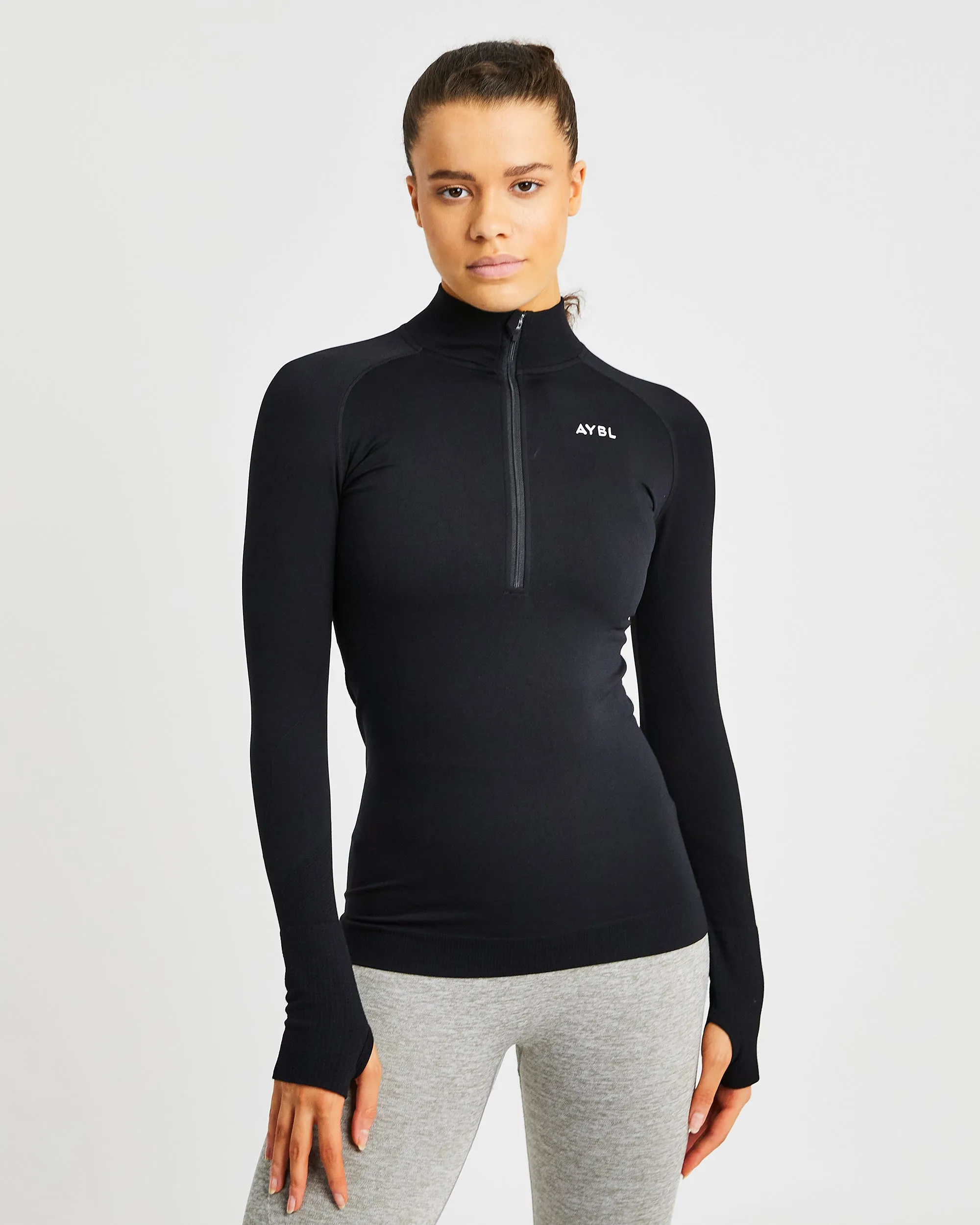 Motion Seamless 1/2 Zip Pullover - Black sold by AYBL