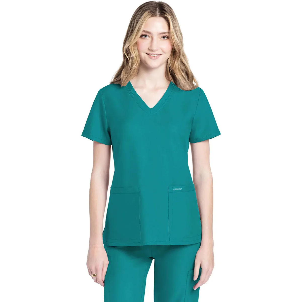 Cherokee Women's Teal Blue 2-Pocket V-Neck Top sold by Merchology