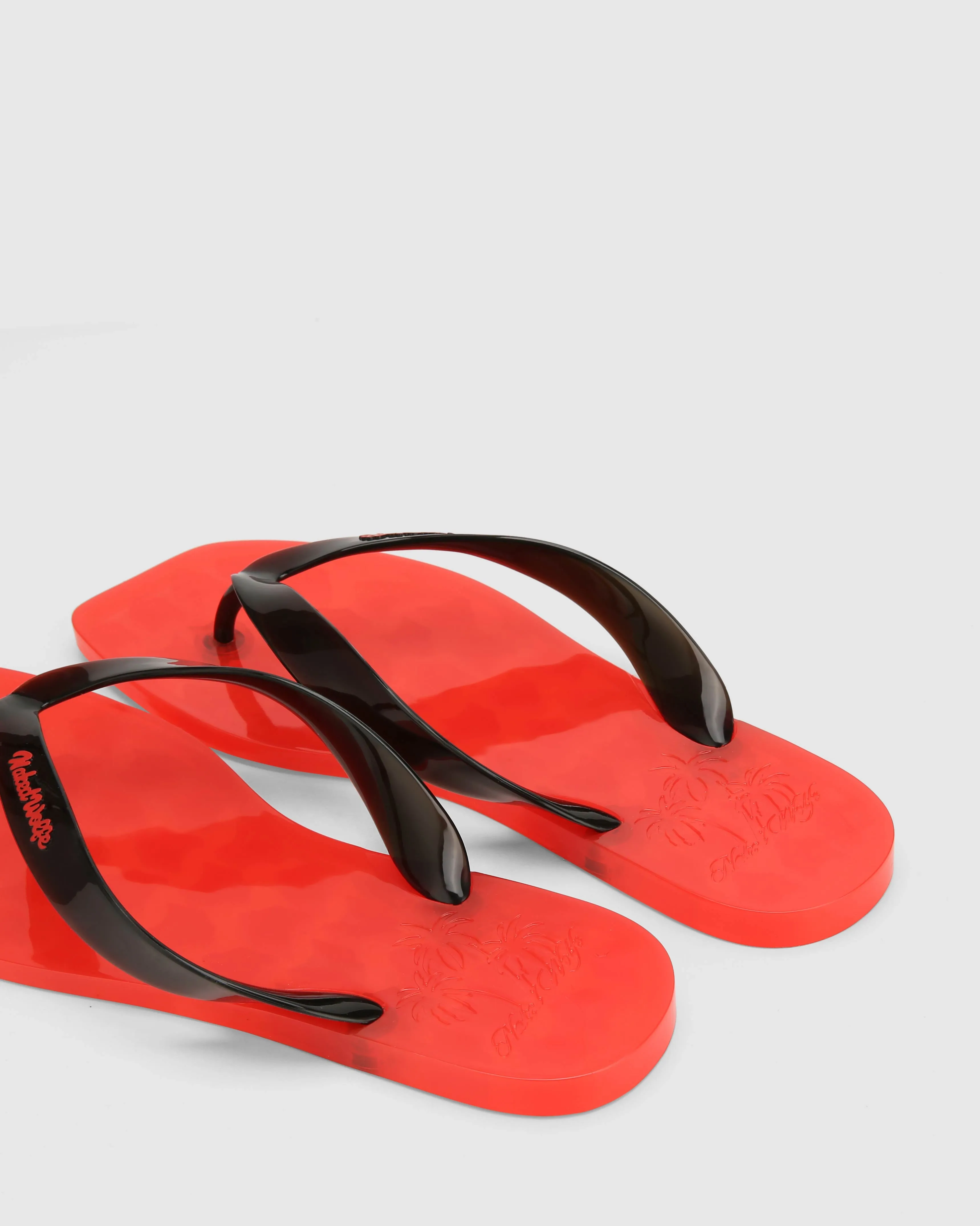 The Surfing Thong Black/Red Jelly sold by naked wolfe product image thumbnail 3