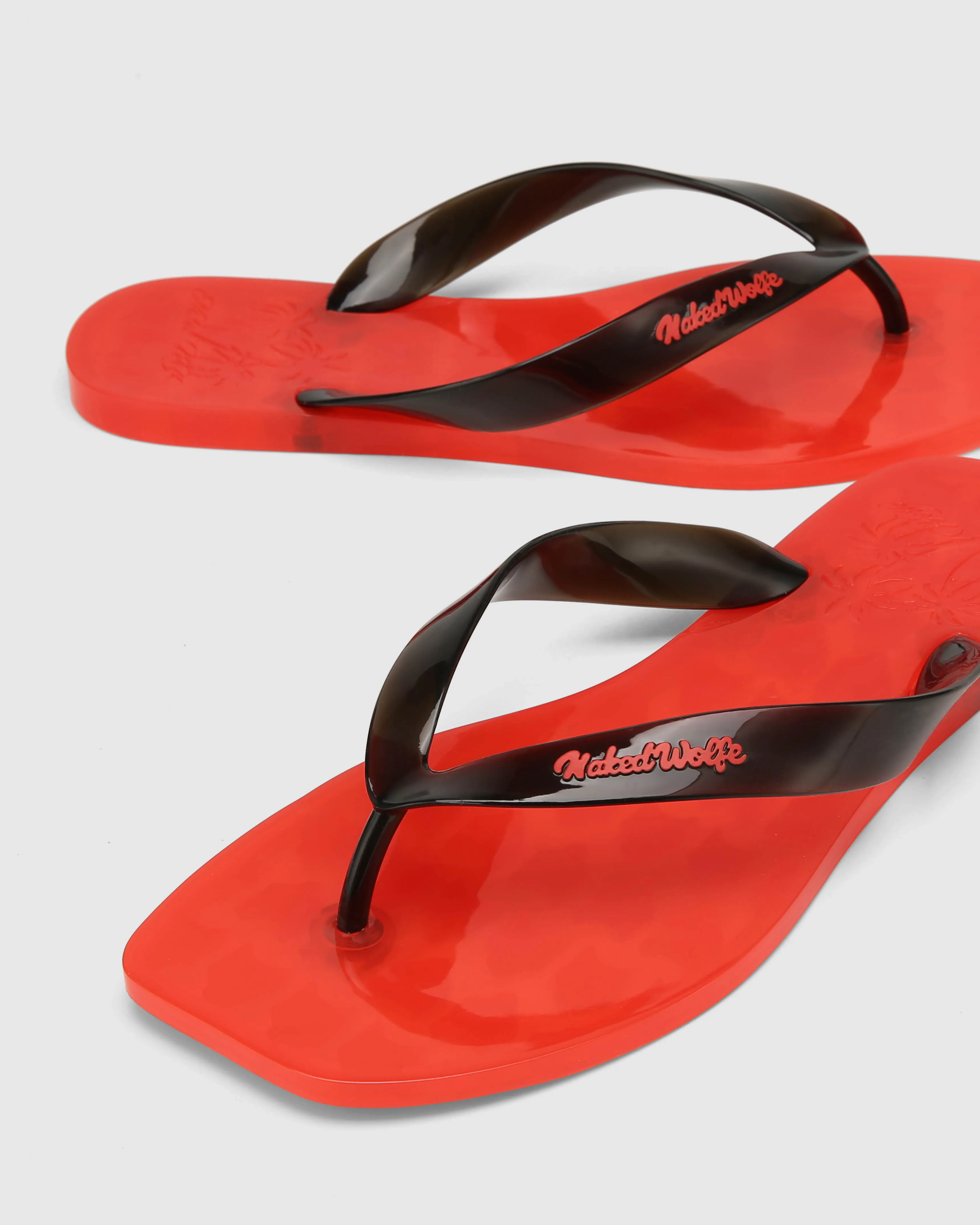 The Surfing Thong Black/Red Jelly sold by naked wolfe product image thumbnail 4