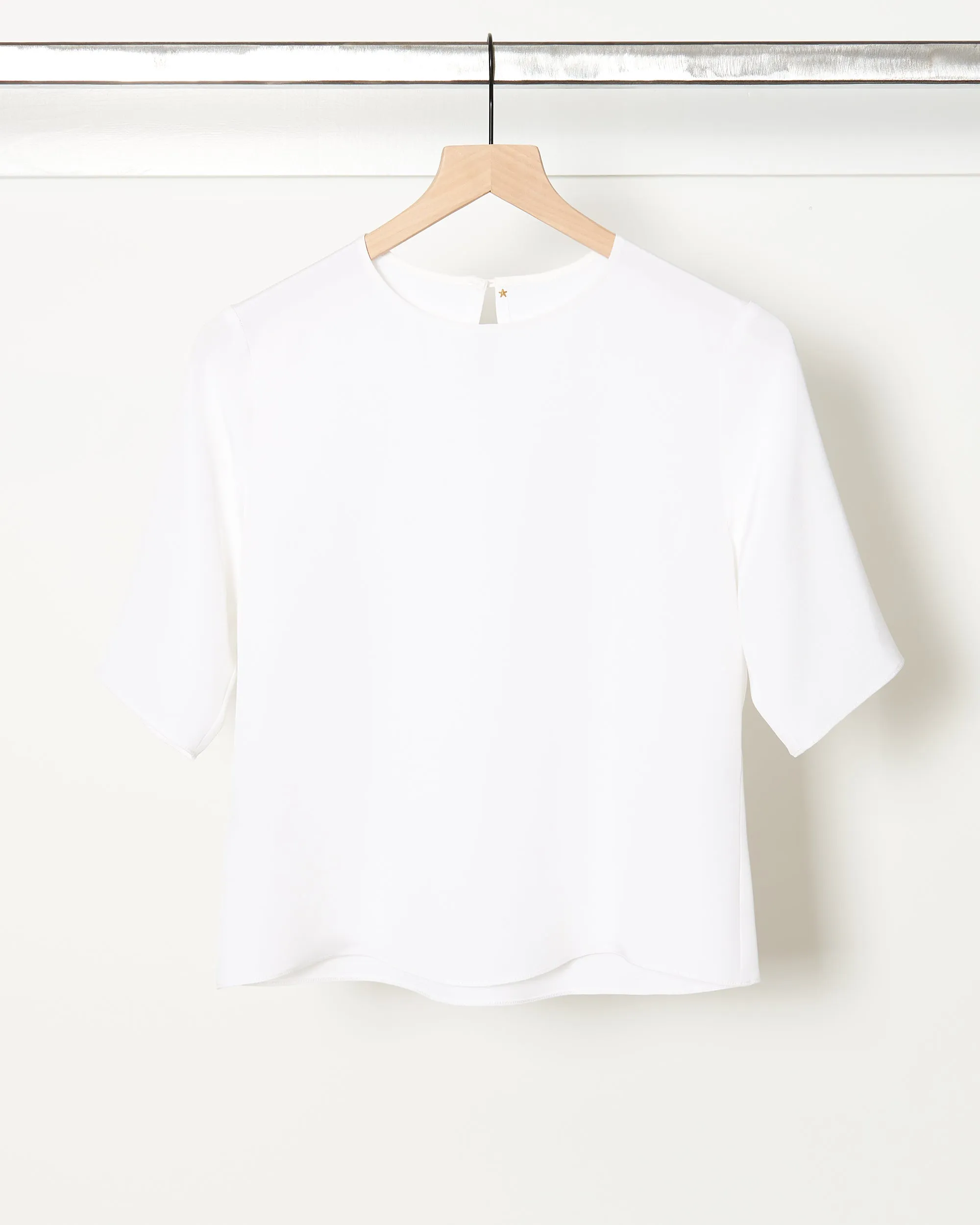 Buddy T White sold by French + Italian