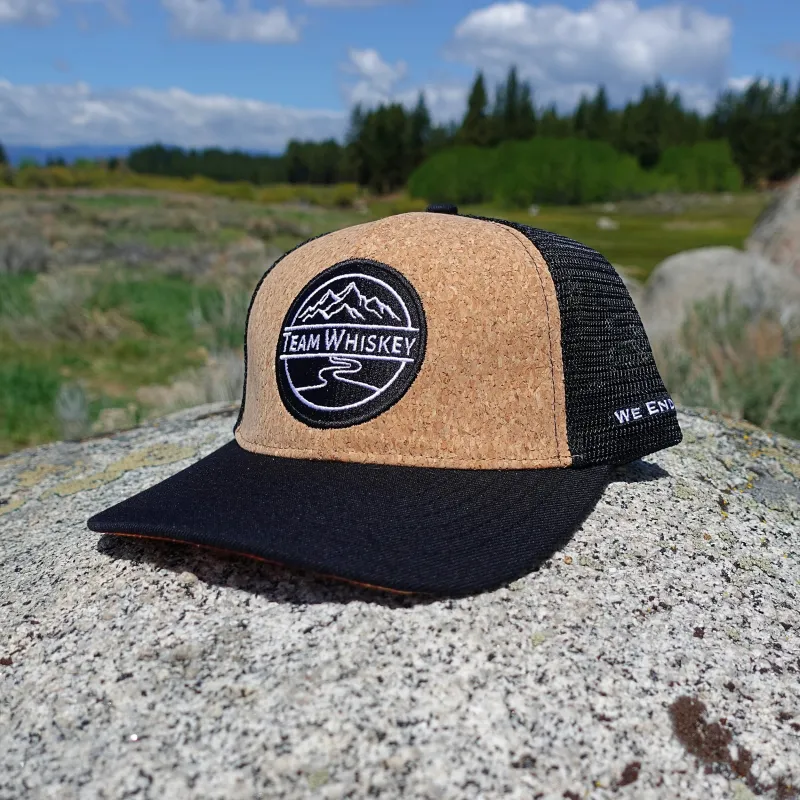 Whiskey Pour Explorer (Curved Bill) sold by Team Whiskey