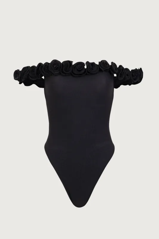 Rosette Off Shoulder One Piece (Faux Suede Black/Black) sold by SAME