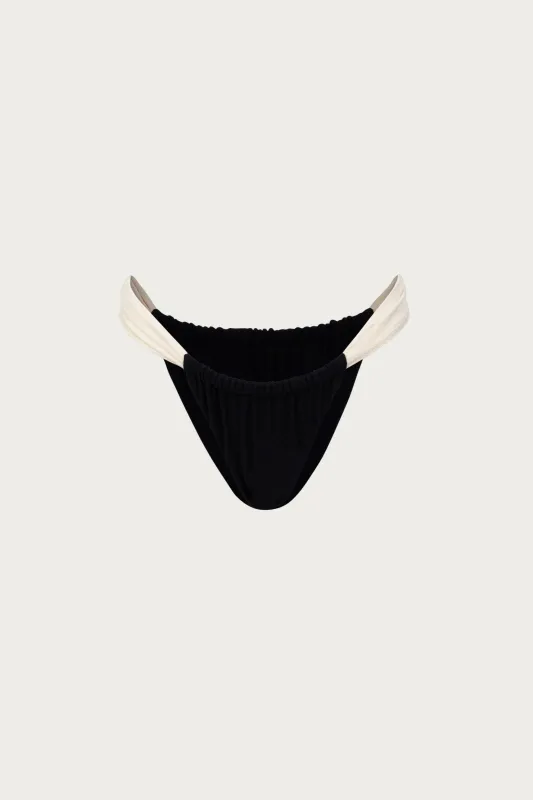 Ruched Bottom (Faux Suede Black/Cream) sold by SAME