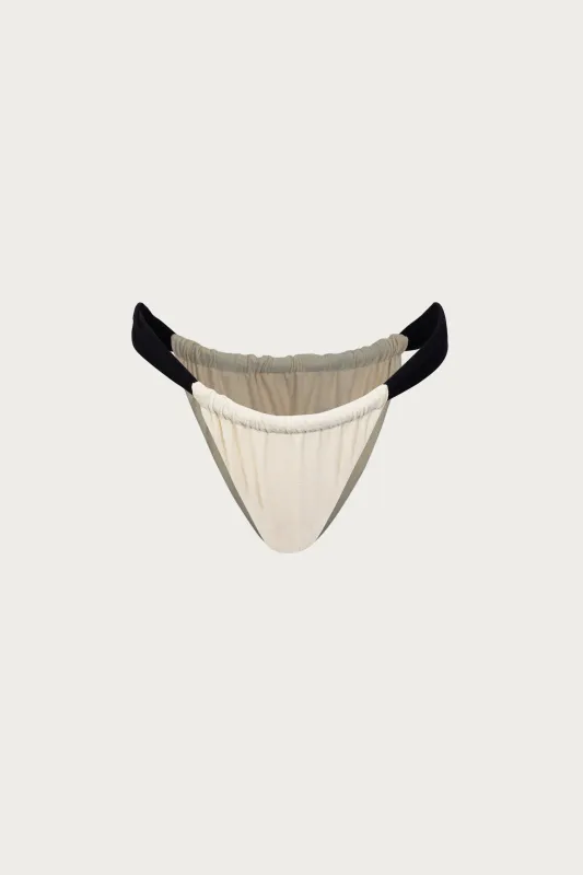 Ruched Bottom (Faux Suede Cream/Black) sold by SAME