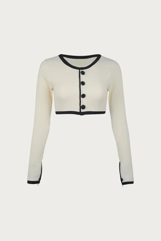 The Grace Rashguard (Ribbed Cream/Black) sold by SAME