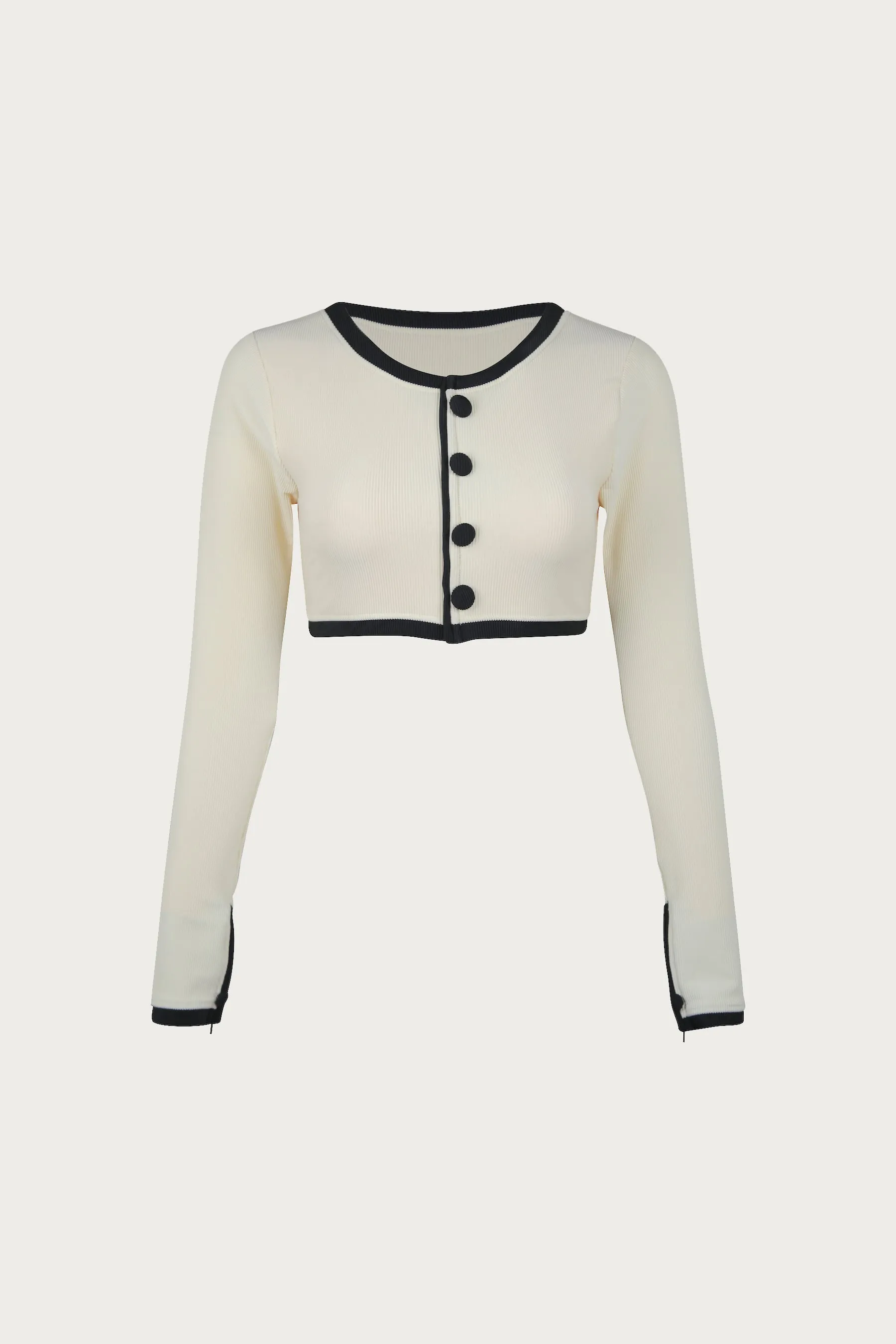 The Grace Rashguard (Ribbed Cream/Black) sold by SAME