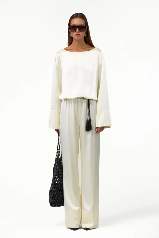 Long Sleeve Silk Jumpsuit (Cream) sold by SAME