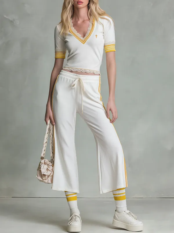 Fashionable Sporty V-neck Lace-trimmed Short-sleeved Top And Capri Pants Set made by Oyrosy