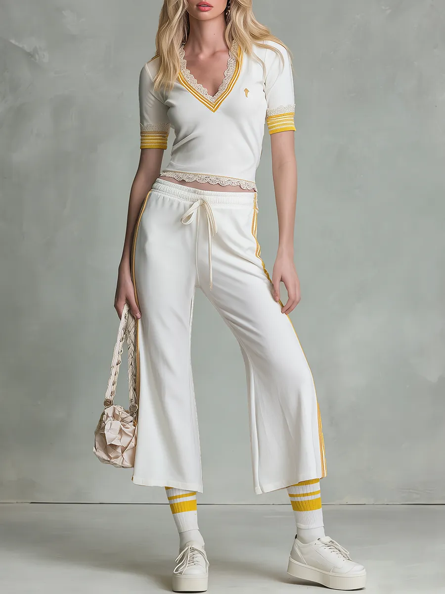 Fashionable Sporty V-neck Lace-trimmed Short-sleeved Top And Capri Pants Set sold by Oyrosy