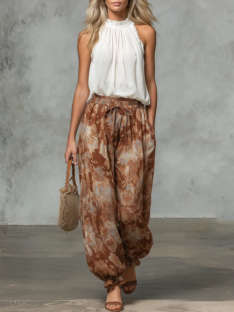 Retro-style Casual Sleeveless A-line Top Paired With Printed Chiffon Wide-leg Pants Set sold by Oyrosy
