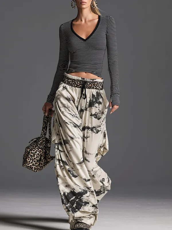 Stylish Sporty Black Striped Top And Printed Wide-leg Pants Set made by Oyrosy